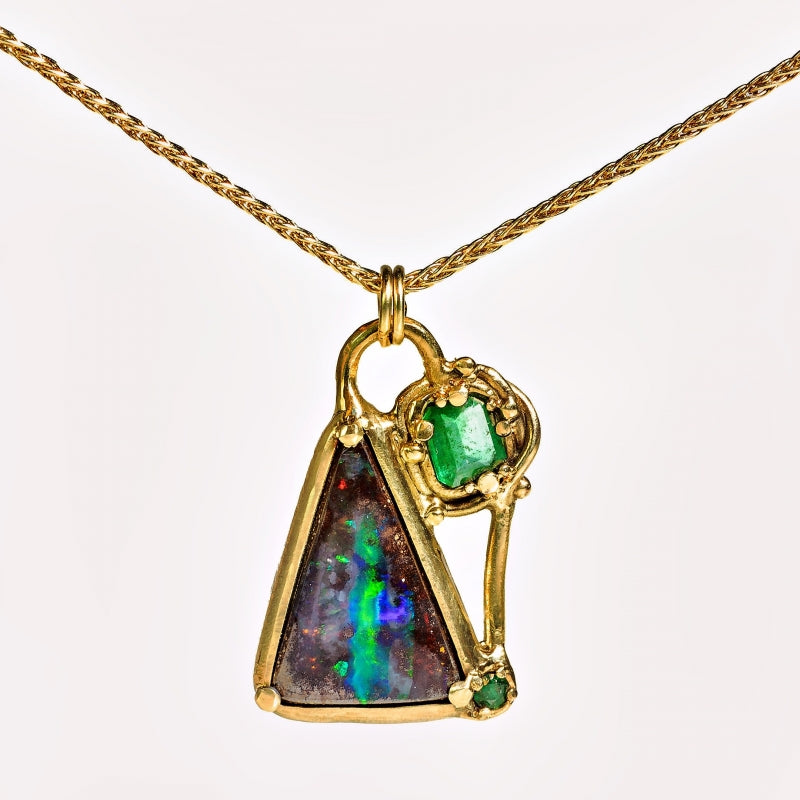 Gold necklace with “crazy” Boulder opal and emerals