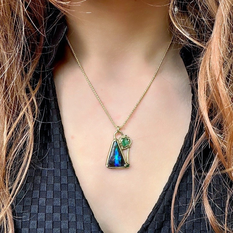 Gold necklace with “crazy” Boulder opal and emerals