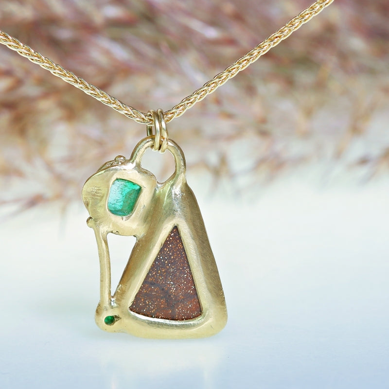 Gold necklace with “crazy” Boulder opal and emerals