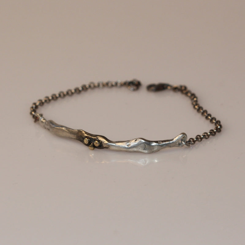 Bracelet Simply metals with three gold dots