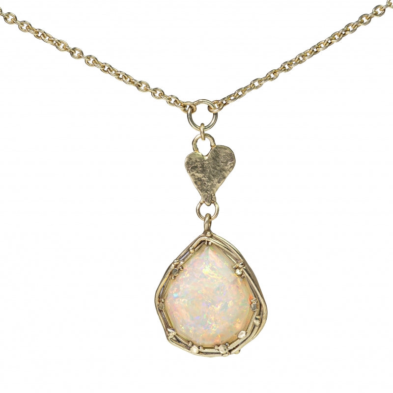 Gold necklace with big opal and heart