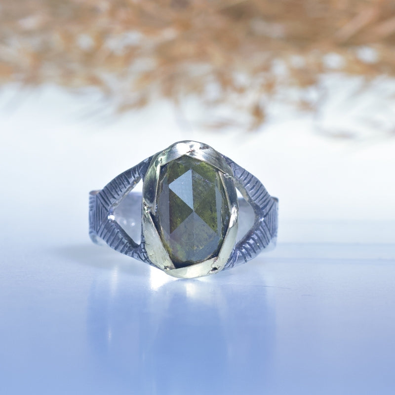 Ring with sphene/titanite and hand engraved band