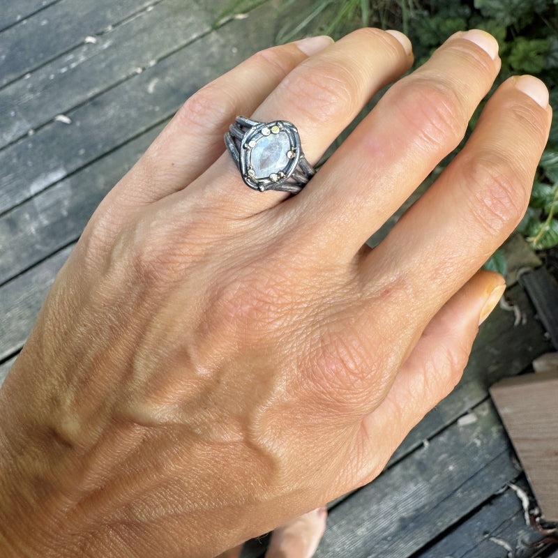 Ring with moonstone and triple band