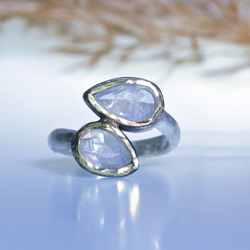 Ring with two pear shape moonstones