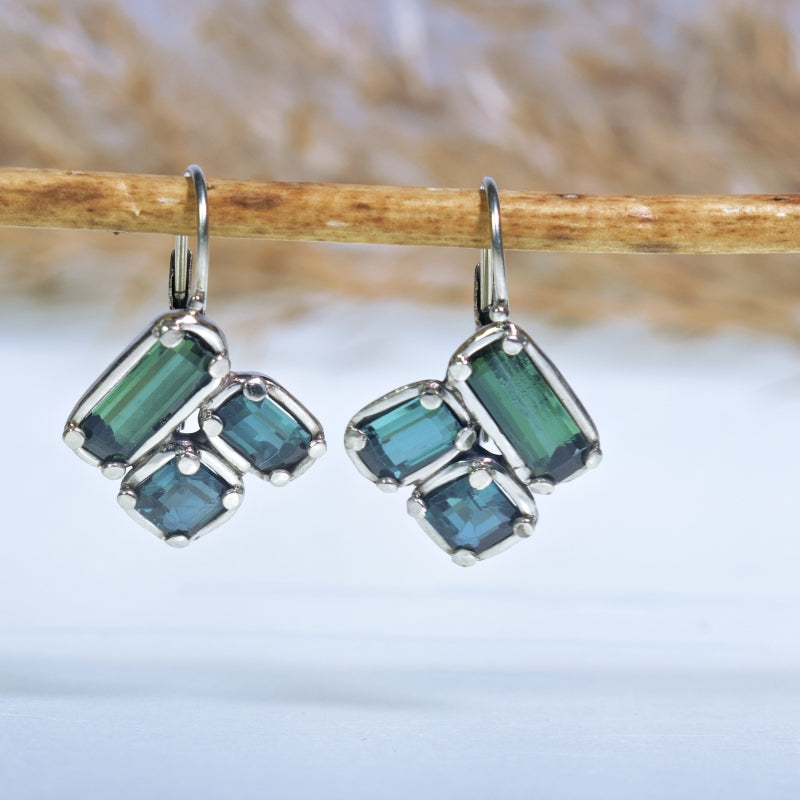 White gold earrings with green-blue tourmalines