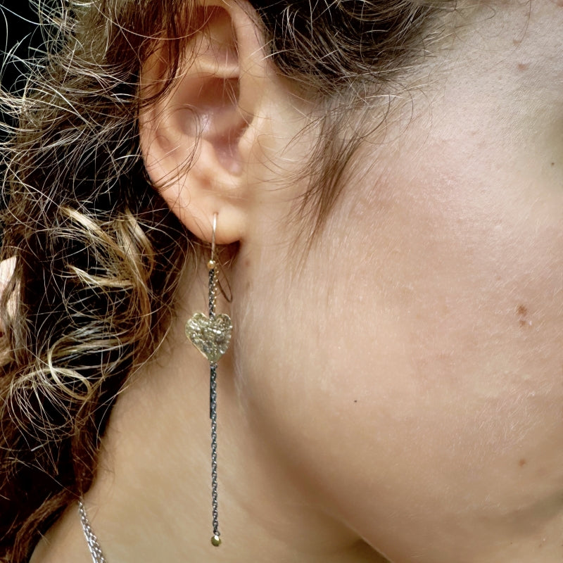Long earrings with gold hearts