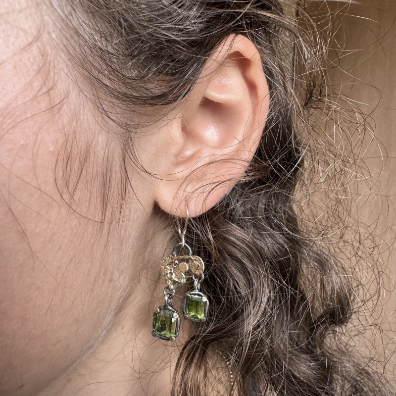 Hanging earrings with pixel cut peridots
