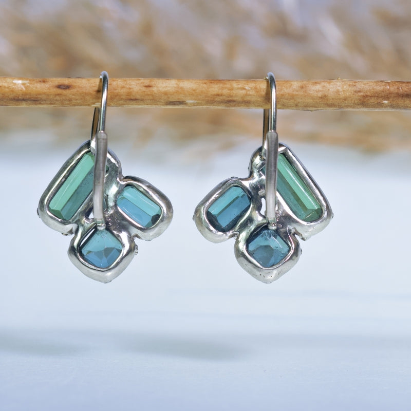 White gold earrings with green-blue tourmalines