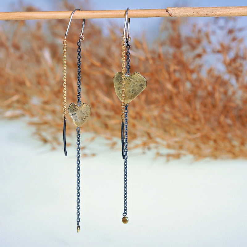 Long earrings with gold hearts