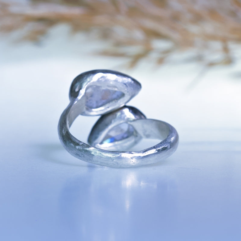 Ring with two pear shape moonstones