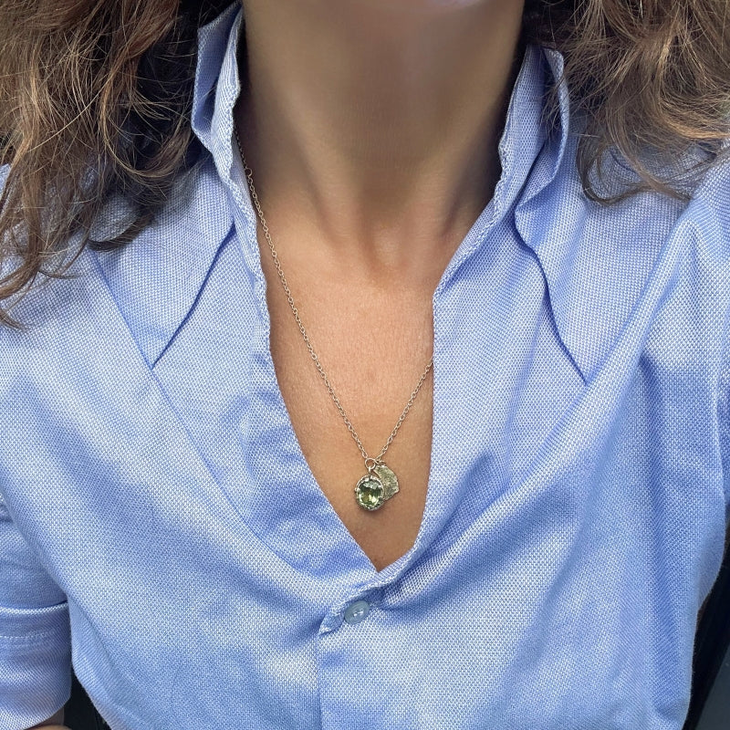 Gold necklace with peridot and halfmoon