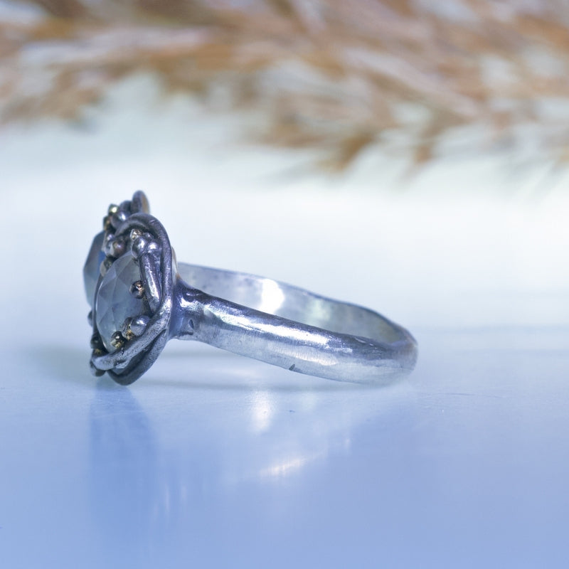 Ring with two moonstones