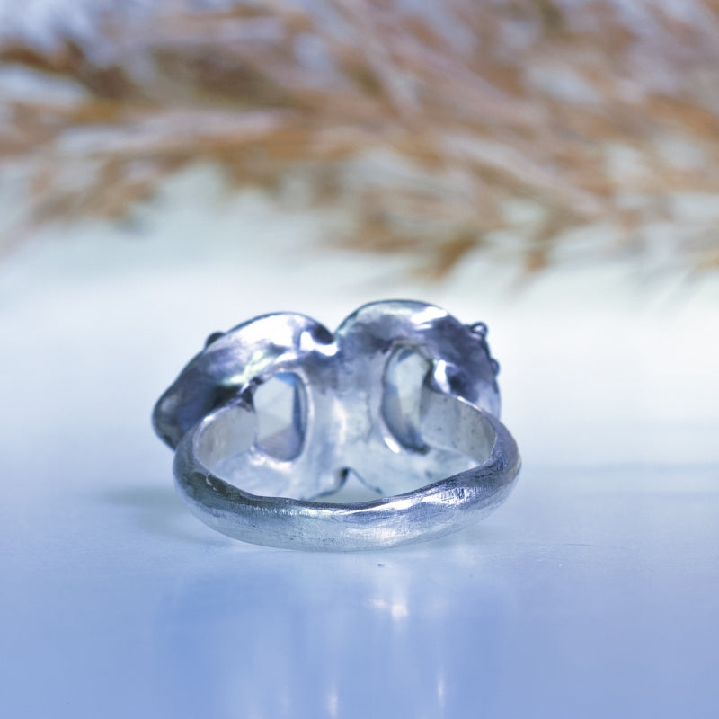 Ring with two moonstones