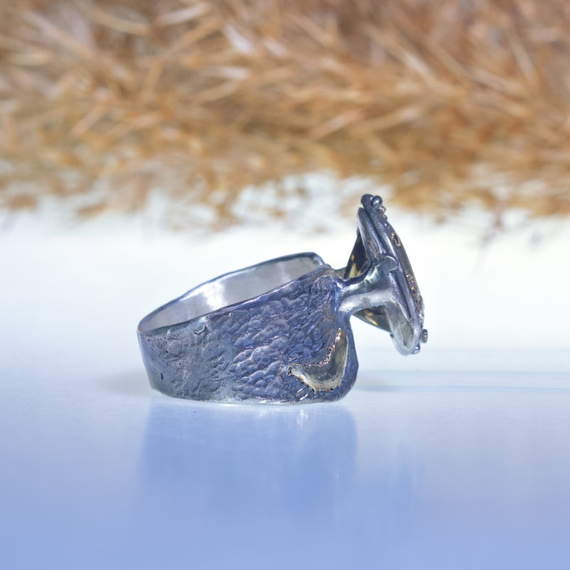 Wide ring with pear shape citrine