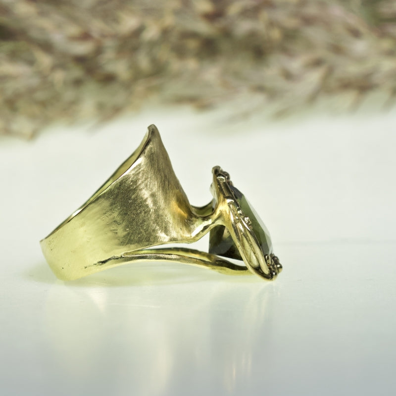 Wide gold ring with heart shape moldavite