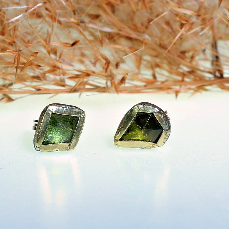 Stud earrings with green geo cut tourmalines