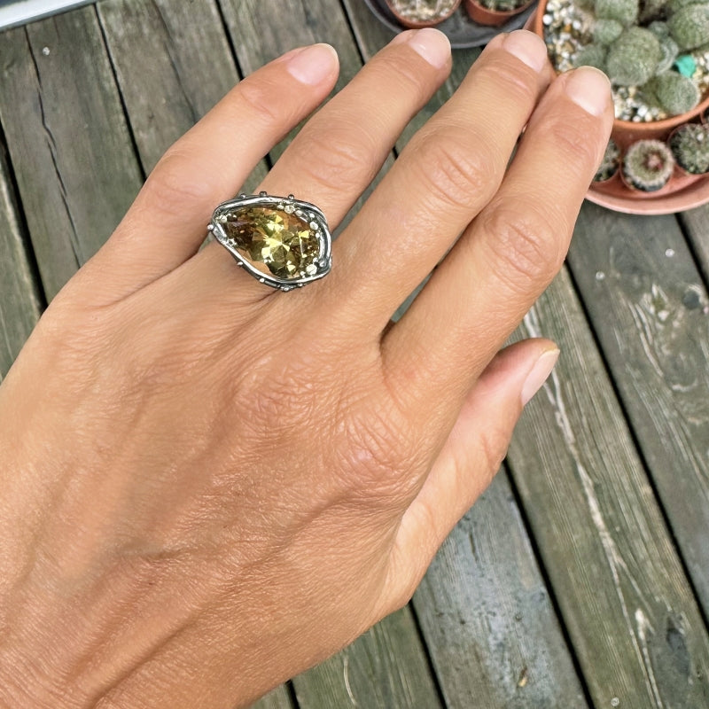 Ring with east-west pear shape precision cut citrine