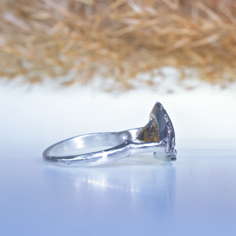 Ring with east-west pear shape precision cut citrine