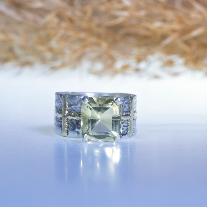 Ring with pale yellow citrine and wide band