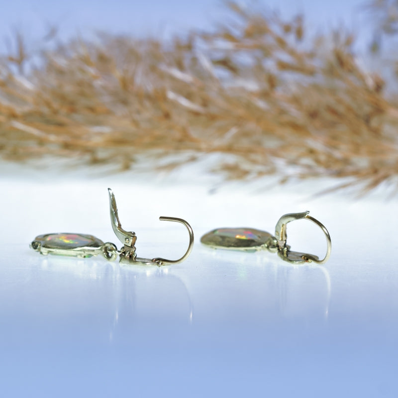 Gold earrings with opals and hearts