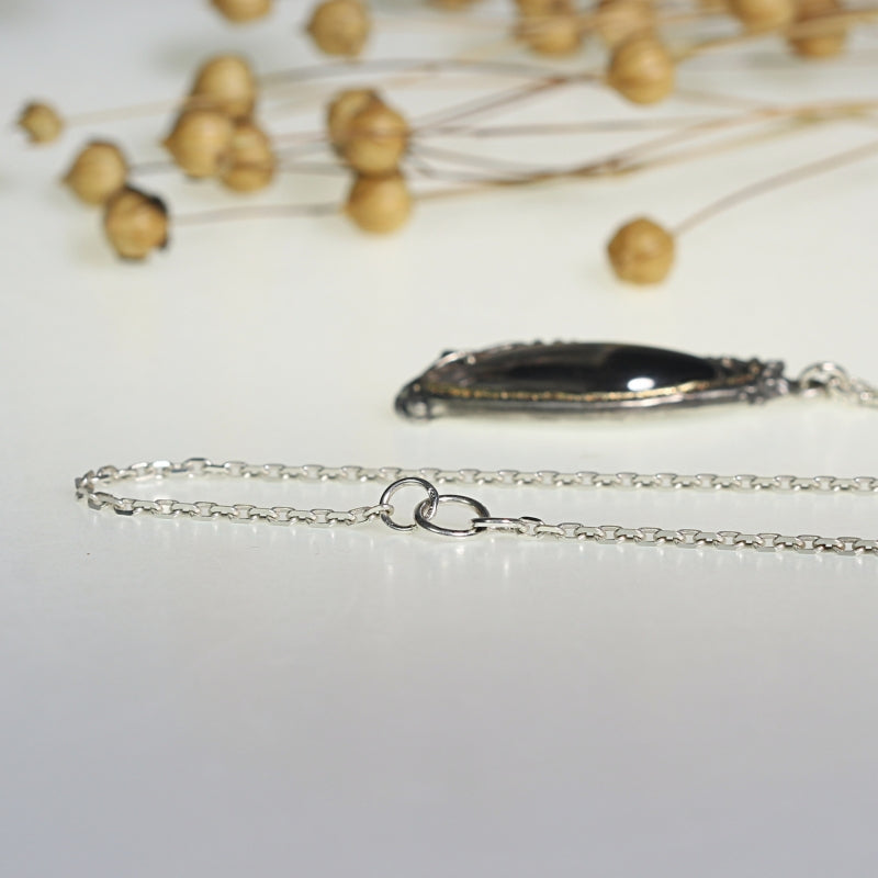 Long necklace with Brookite