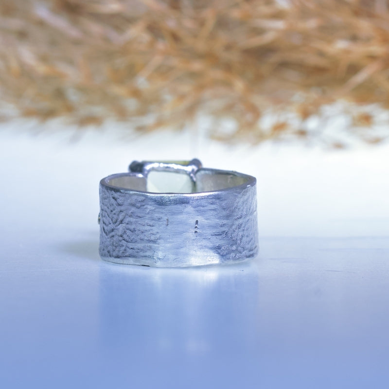 Ring with pale yellow citrine and wide band