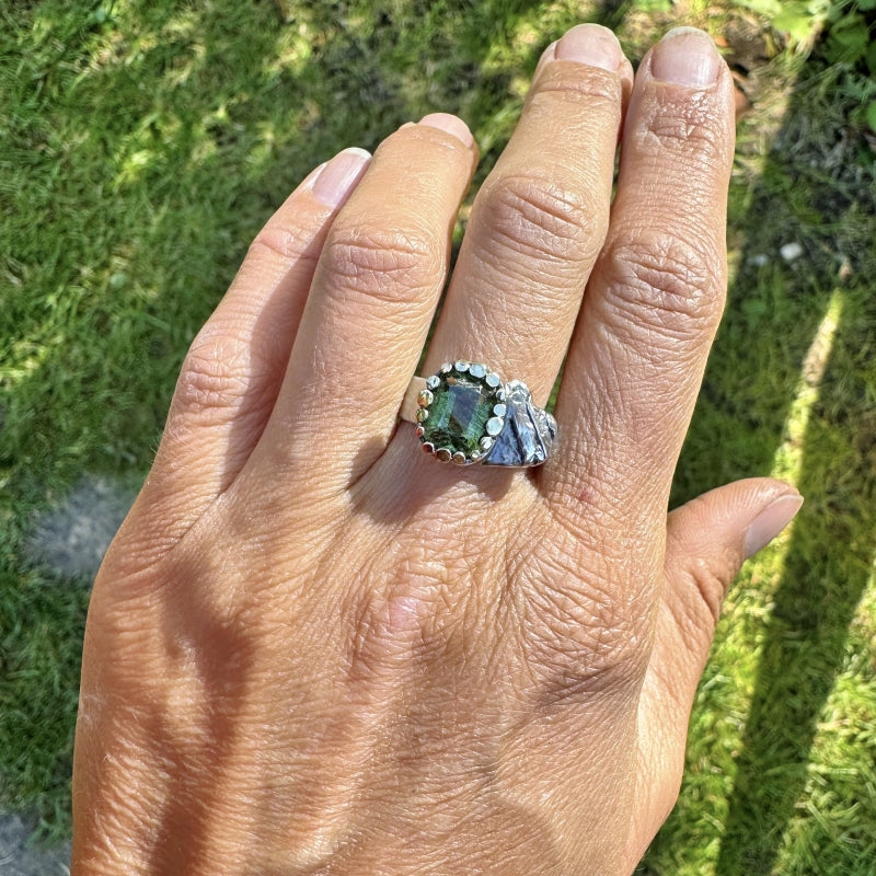 Ring with rutile peridot and silver heart