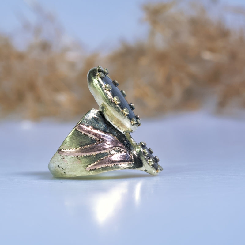 Wide gold ring with Gold Sheen sapphire