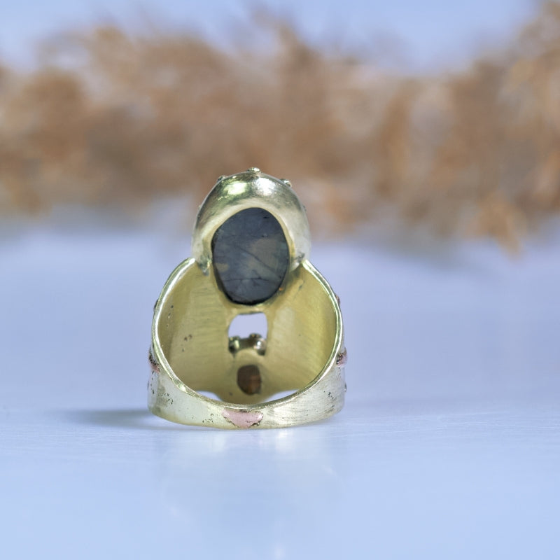 Wide gold ring with Gold Sheen sapphire