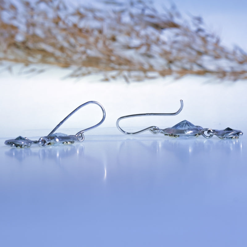 Hanging earrings with four aquamarine