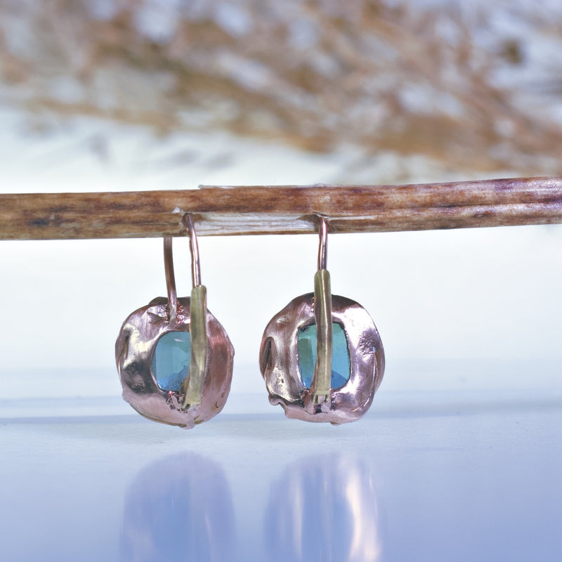 Rose gold hanging earrings with green tourmalines