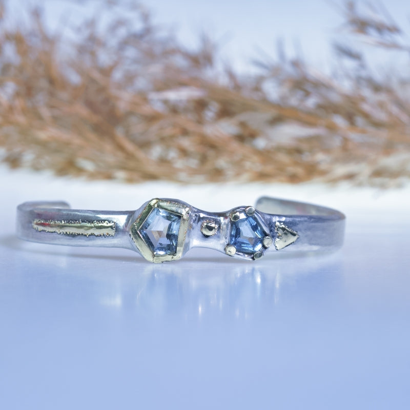 Cuff bracelet with two aquamarines