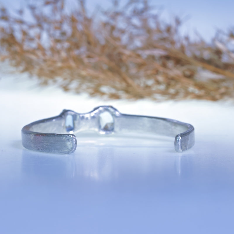 Cuff bracelet with two aquamarines
