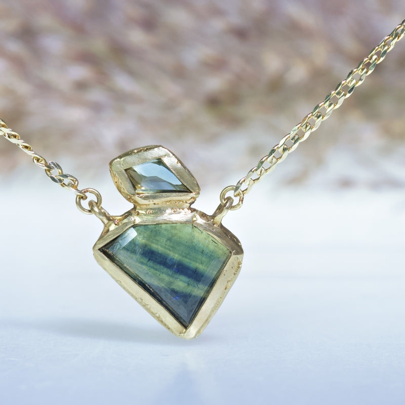 Gold necklace with two geometric sapphire