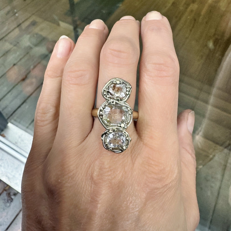 Gold ring with three petroleum quartz