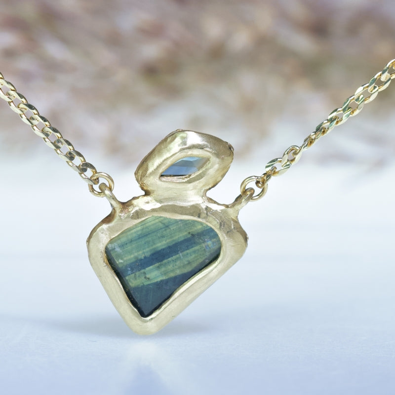 Gold necklace with two geometric sapphire