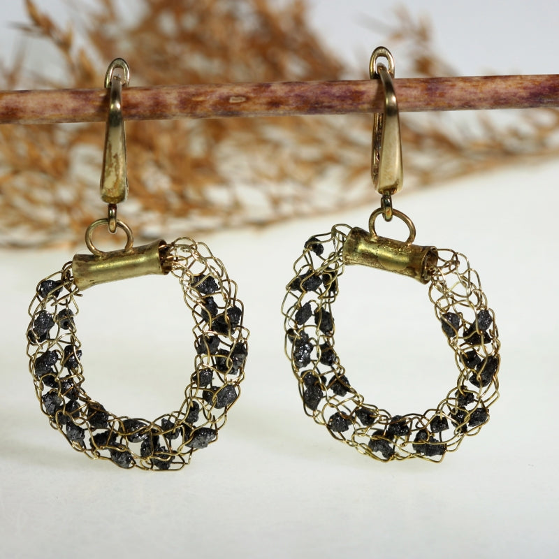 Circle Energy earrings with black raw diamonds