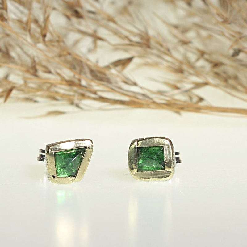 Stud earrings with tsavorite garnets