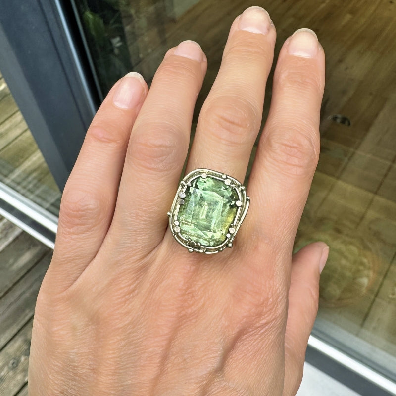 Statement gold ring with pale green tourmaline