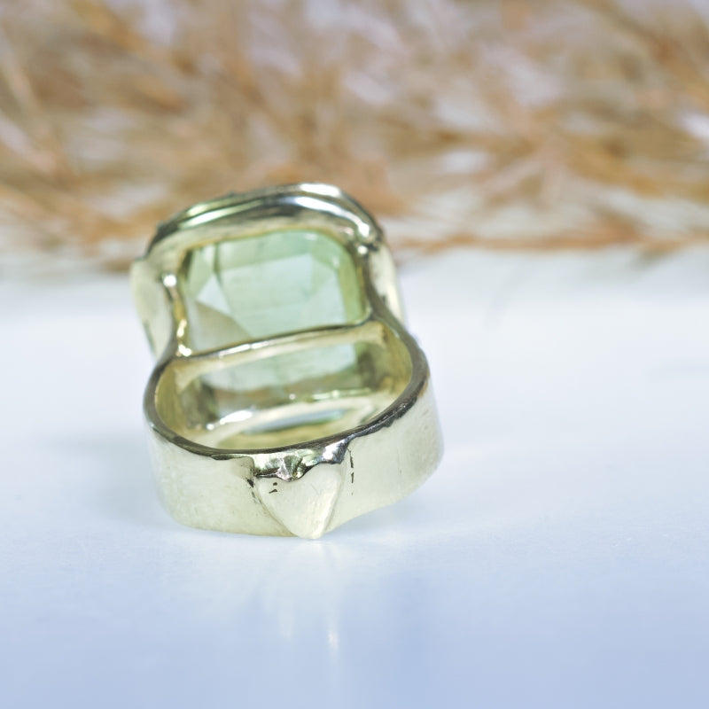 Statement gold ring with pale green tourmaline