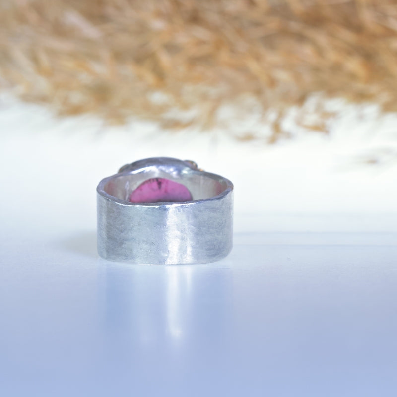 Ring with pink oval tourmaline and wide band
