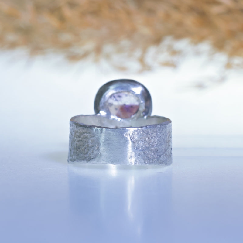 Ring with rutile amethyst and wide band