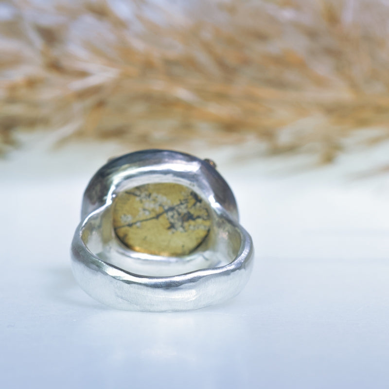 Ring with “golden stone”: pyrite in quartz and gold dots