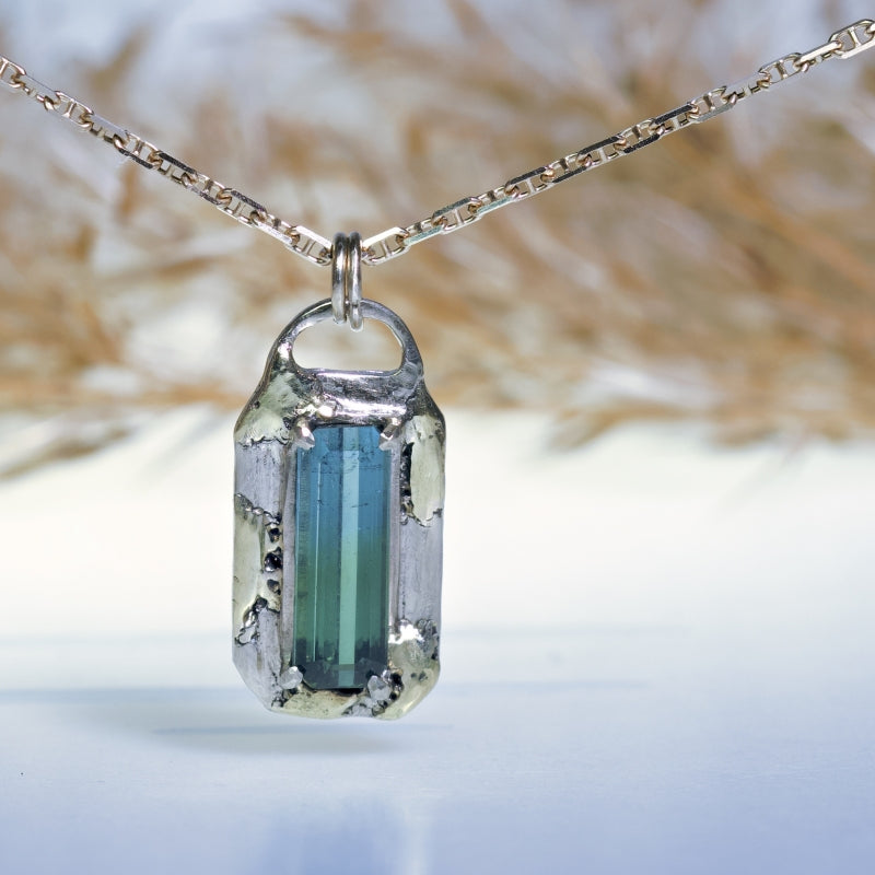 White gold necklace “Venetian mirror” with bluegreen tourmaline