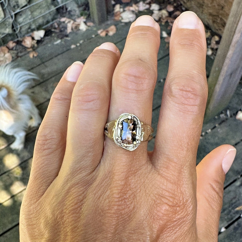 Gold ring with brown zircon and hearts