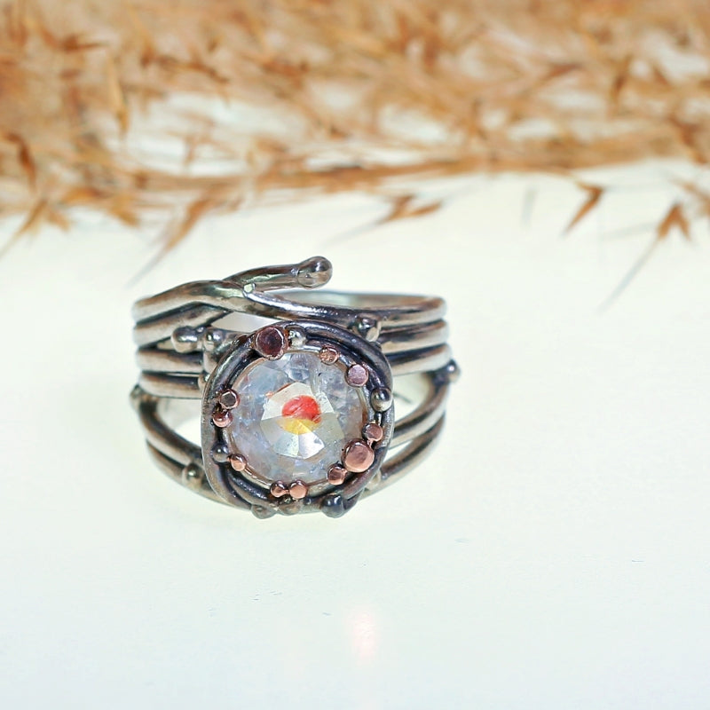 Wide Galaxy ring with irone oxide quartz