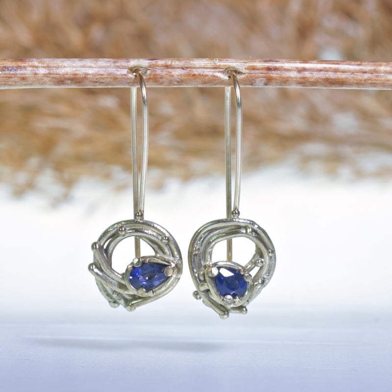 Gold hanging earrings with blue Kashmir sapphire