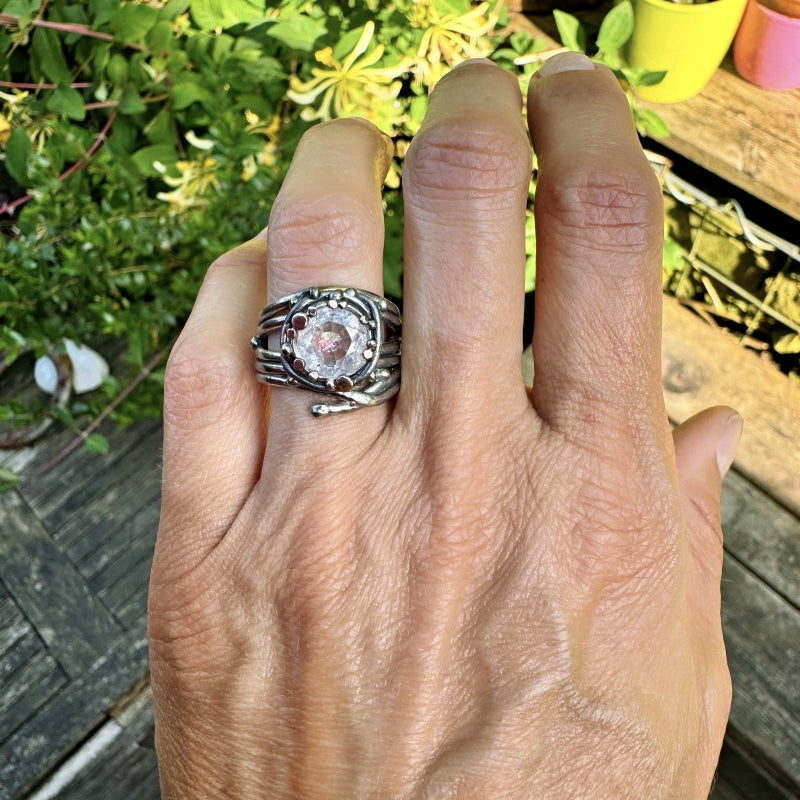 Wide Galaxy ring with irone oxide quartz