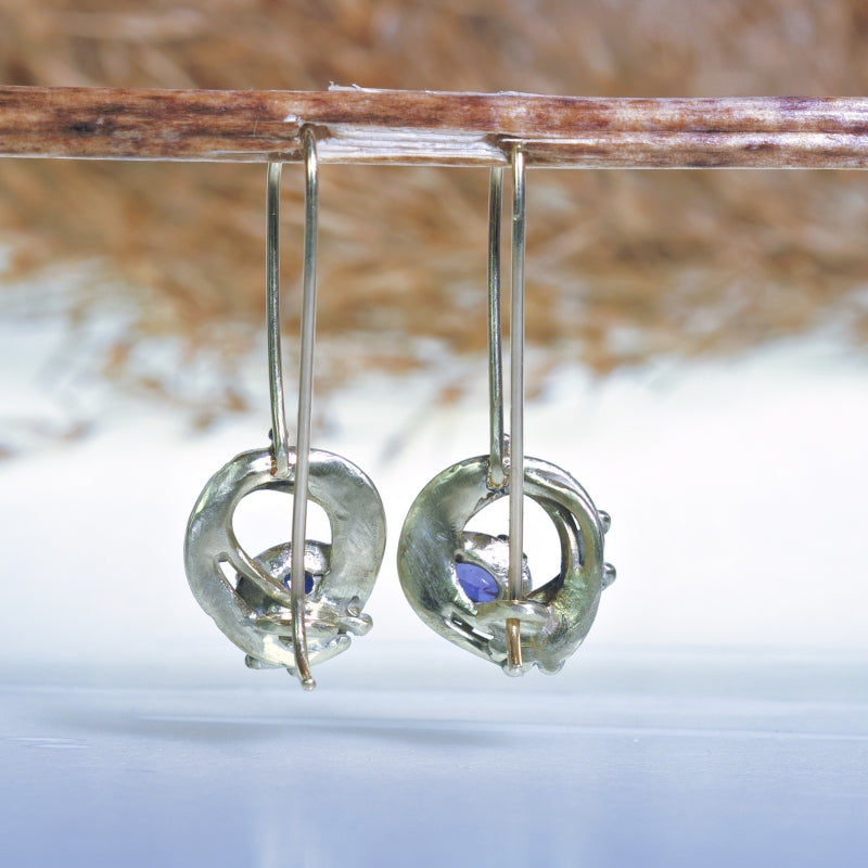 Gold hanging earrings with blue Kashmir sapphire