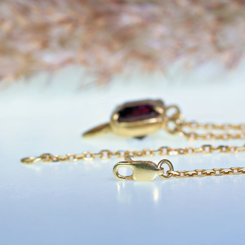Gold necklace with watermelone tourmaline and heart